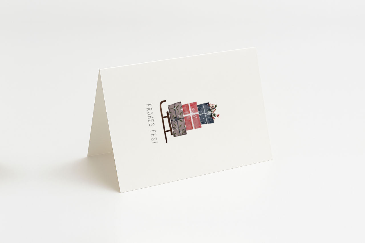 Frohes Fest – Schlitten mit Geschenken