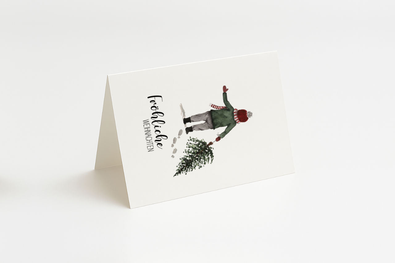 Fröhliche Weihnachten – Junge mit Tannenbaum