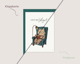 Lesen ist mein Lieblingsort – Kater im Ohrensessel