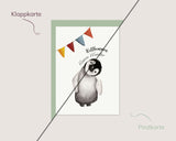Willkommen, kleines Wunder. – Babypinguin mit Wimpelkette