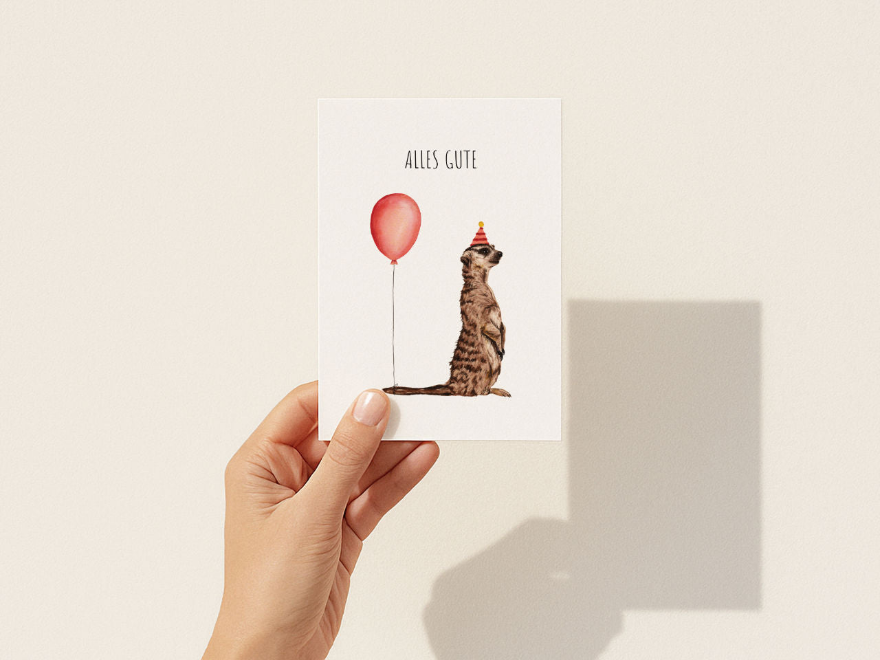 Alles Gute – Erdmännchen mit Luftballon
