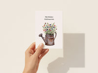 Herzlichen Glückwunsch – Gießkanne voller Blumen