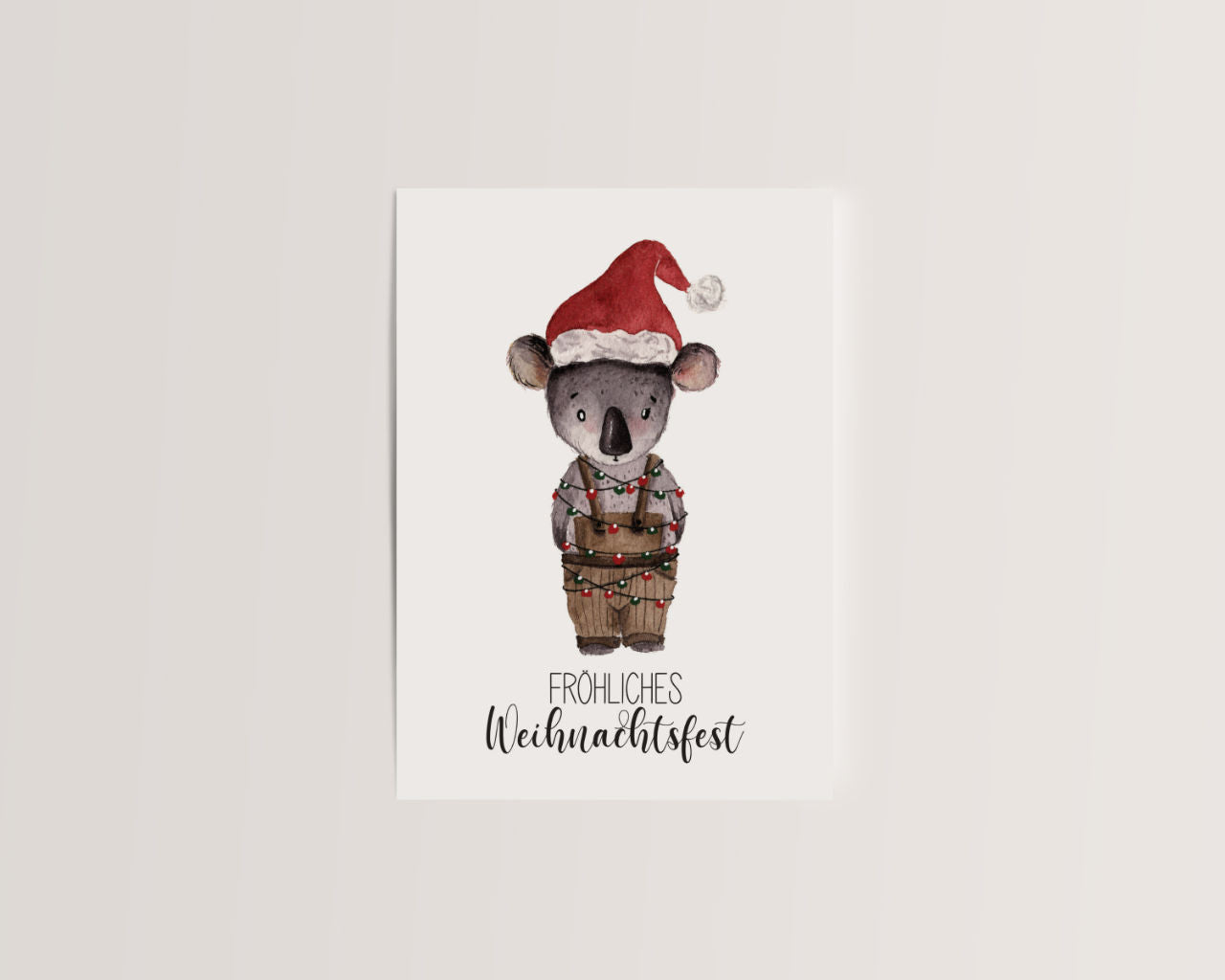 Fröhliches Weihnachtsfest – Koala mit Lichterkette