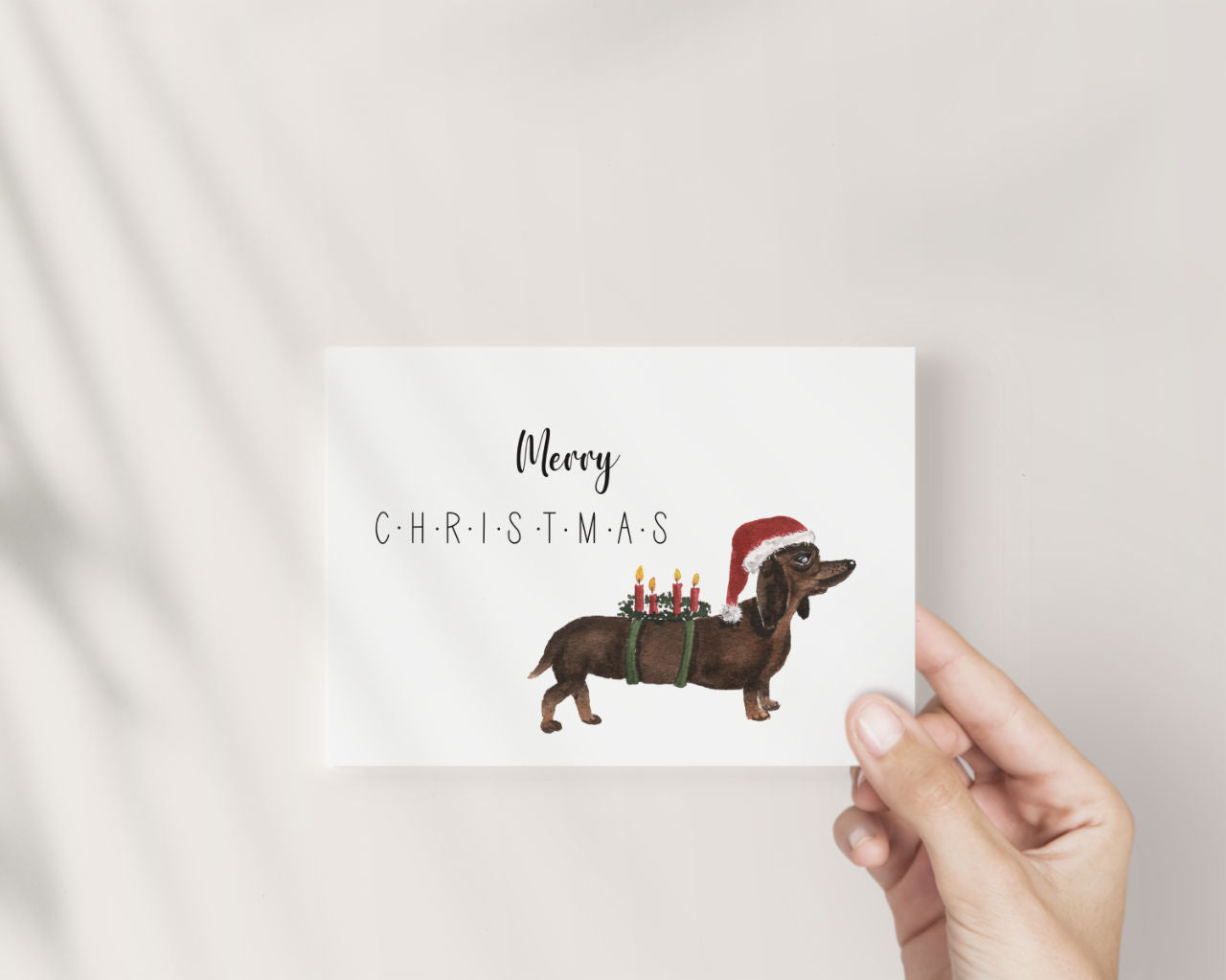 Merry Christmas – Dackel mit Adventskranz