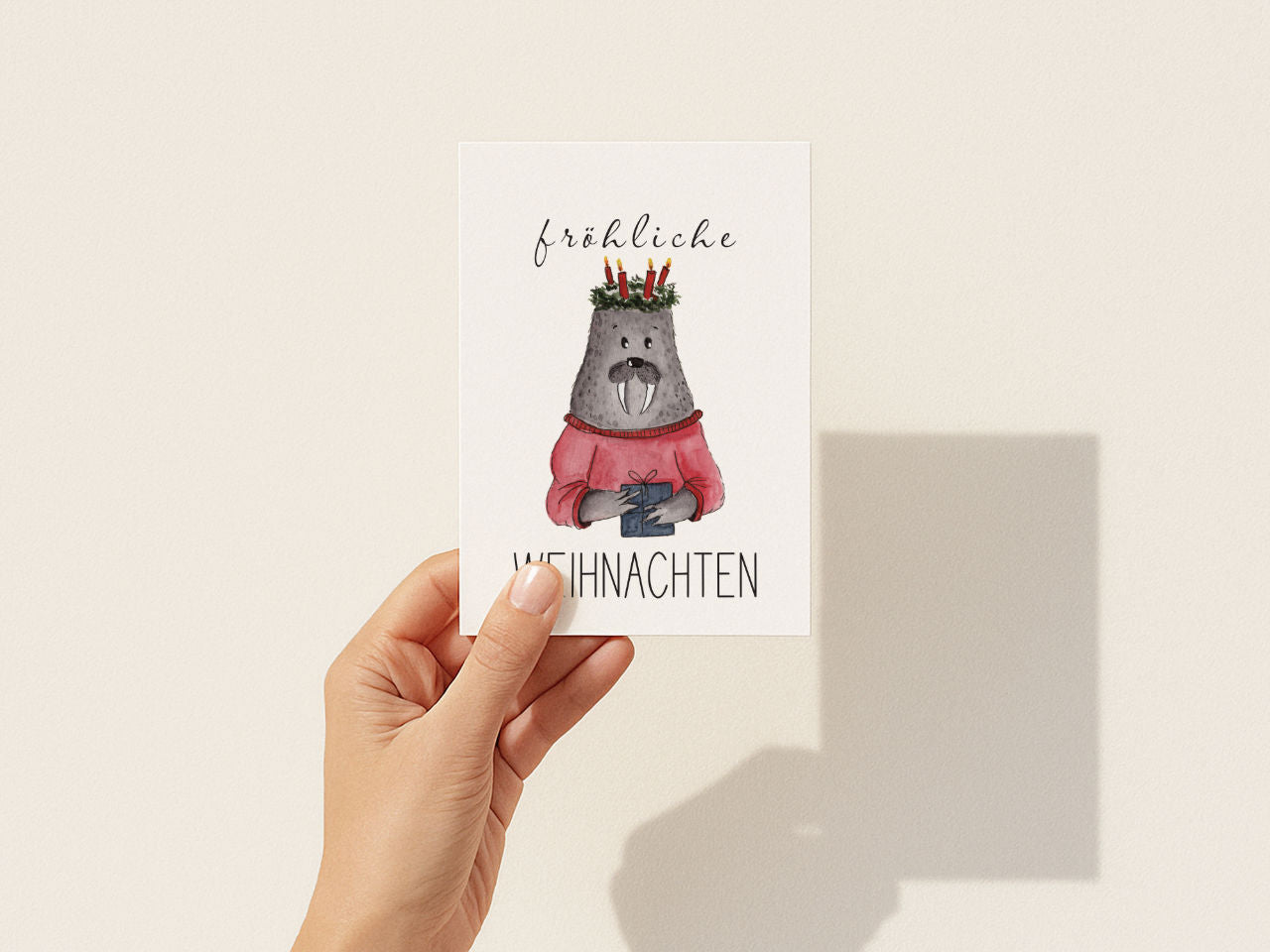 Fröhliche Weihnachten – Walross mit Geschenk